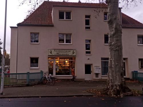 DHL Paketshop 487 - In Feinbäckerei Thomas