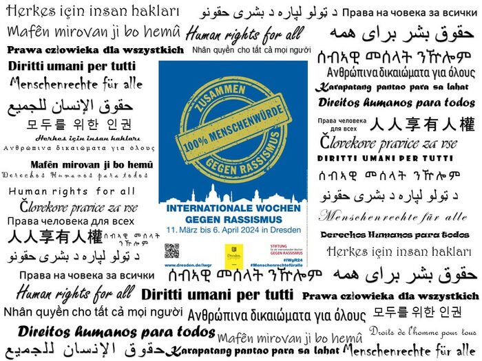 Menschenrechte für alle in verschiedenen Sprachen und in der Mitte ein Plakat mit der Aufschrift "100 % Menschenwürde, zusammen gegen Rassismus"