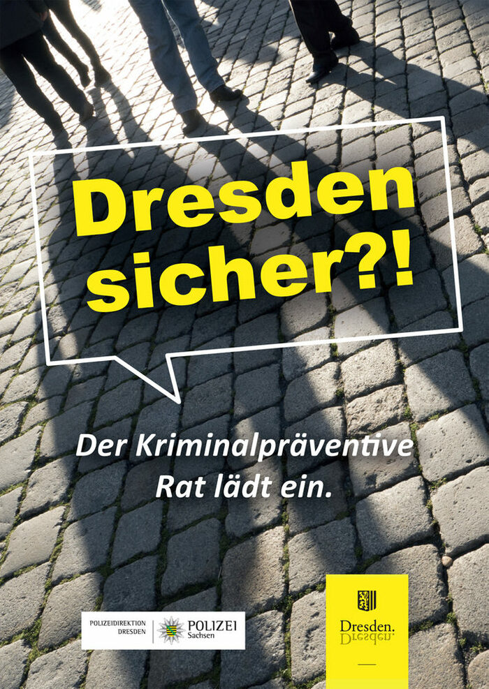 dunkel Schatten auf Pflastersteinen und Schriftzug: "Dresden sicher?"