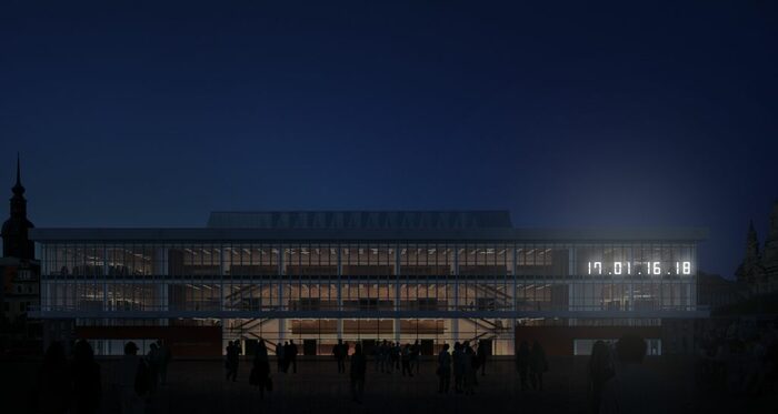 Kulturpalast bei Nacht mit leuchtender Datumsanzeige rechts oben