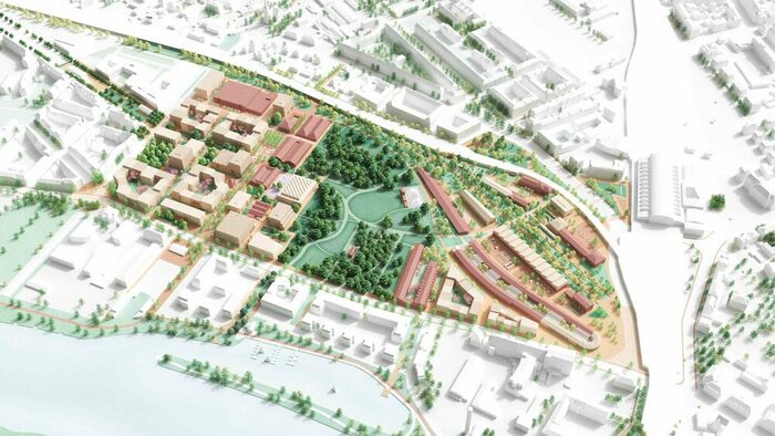 Karte mit Grünraum in der Mitte und Häusern rings herum, unten blaue Fläche und oben weiße Fläche mit Häusern