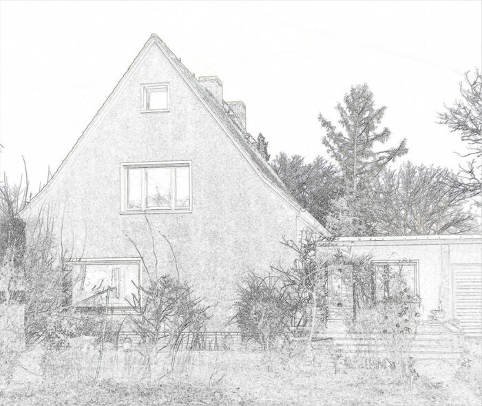 Foto eines Einfamilienhauses mit Garagenanbau