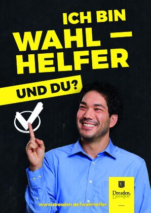 Mann in blauen Hemd vor schwarzem Hintergrund zeigt auf Haken im weißen Kreis, gelber Schriftzug: Ich bin Wahlhelfer! Und DU?